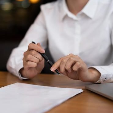 businessman-ready-sign-papers-office (1)